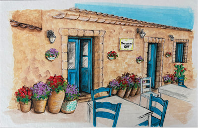 Casa Siciliana con Porte Azzurre e Fiori Mediterranei